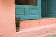 Bright turquoise green with pink wall in Greece