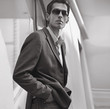 Handsome guy posing in sunglasses