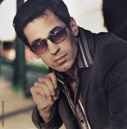 Photo: Portrait of a confident young man Portrait of a confident young man