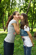 Girl friends kissing