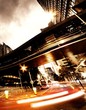 Fast moving cars at night