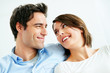 Happy young couple looking at each other