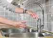 Filling a glass of water