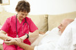 Home Health Nurse Takes Pulse
