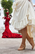 Two Traditional Women Spanish Flamenco Dancers In Town Square