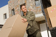Photo: Happy delivery man Happy delivery man