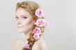 Woman with with flowers and roses in hair