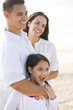 Photo: Portrait of happy Hispanic family with young girl Portrait of happy Hispanic family with young girl