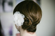 white flower in hair up do style white flower in hair up do style