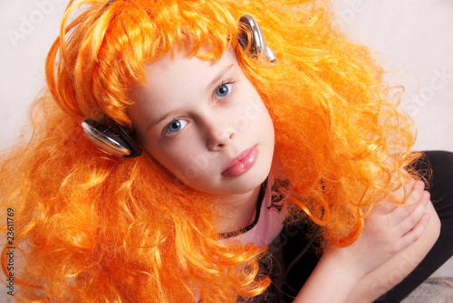 Photo: Redhead girl listen to music Redhead girl listen to music