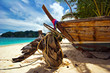 Old Thai boat at the beach. Phi Phi island. Thailand