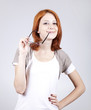 Young smiling businesswomen in white with glasses.
