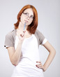 Young businesswomen with pen in hand