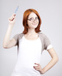Young businesswomen with pen in hand