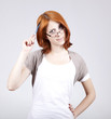Young businesswomen with pen in hand
