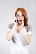 Young Businesswomen in white speaking by mobile phone.