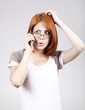Young Businesswomen in white speaking by mobile phone.