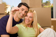 Happy couple holding keys