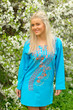 beautyful woman in national blue clothes