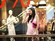 girl in shop calls by phone girl in shop calls by phone