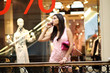 girl in shop calls by phone girl in shop calls by phone
