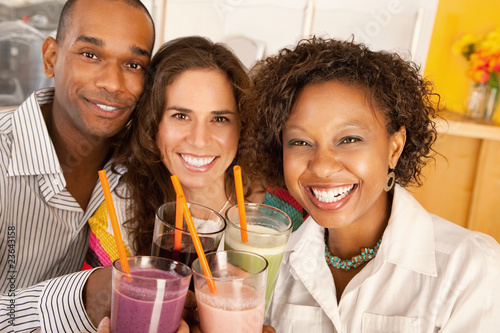 Photo: Friends Socializing Over Smoothies Friends Socializing Over Smoothies