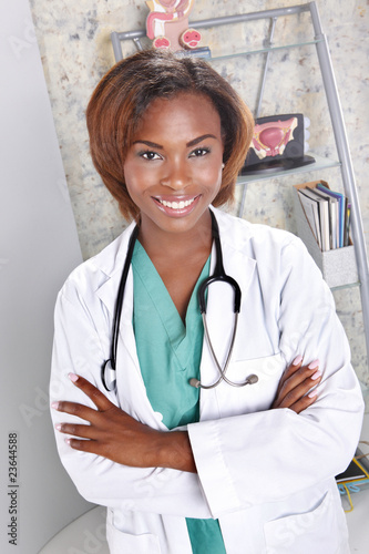Photo: Expressions of a doctor at her office Expressions of a doctor at her office
