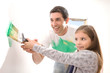 Father and daughter painting