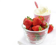 Bowl of strawberries with whipped cream