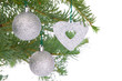 Silver decorations on pine branch