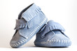 Close-up photograph of blue baby shoes