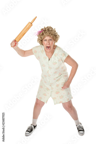 Photo: Angry womn with rolling pin Angry womn with rolling pin