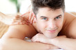 Beautiful man enjoying a back massage