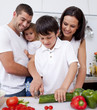 Jolly family cooking together