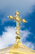 Close-up of Golden crucifix and Cupola of Orthodox church