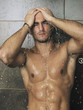 good looking man under man shower good looking man under man shower