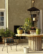 Table and Chairs in Front of Fireplace on Patio