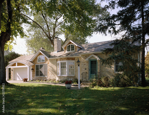 Photo: Stone and Wood Shake Facade on Traditional House Stone and Wood Shake Facade on Traditional House