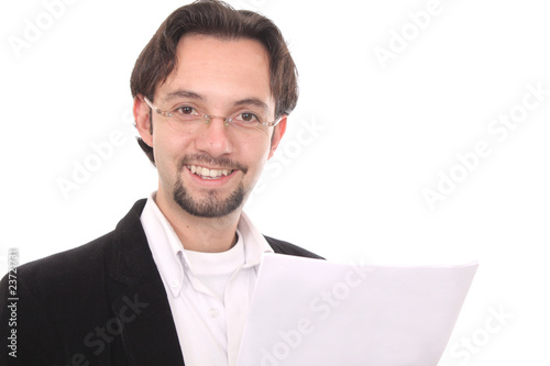 Photo: Business man writting in a notepad Business man writting in a notepad