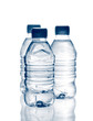 purified spring mineral water in the bottles with reflection purified spring mineral water in the bottles with reflection