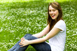 Girl sitting on the grass