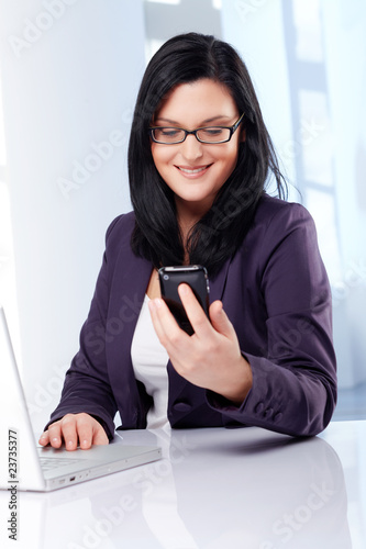 Business woman with smartphone Business woman with smartphone