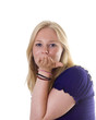 Blonde girl blowing a kiss towards camera