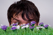 Boy looking through lawn. Boy looking through lawn.