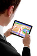 businessman holding a touchpad pc, using the navigation programm
