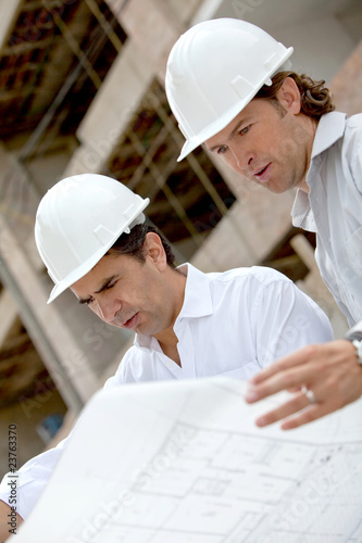 Photo: Architects at a construction site Architects at a construction site