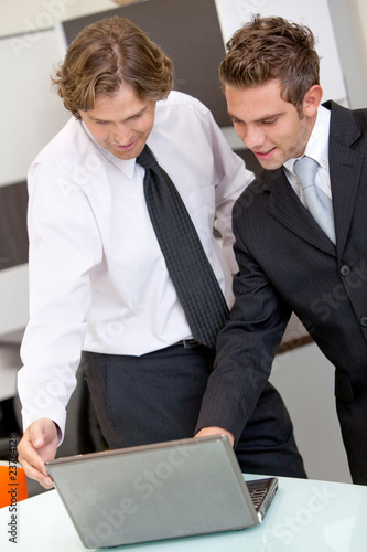 Photo: Business men at the office Business men at the office