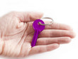Photo: puple key in the hand puple key in the hand