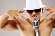 Glamorous man sing a song