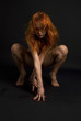 Foto: naked redhead woman over black naked redhead woman over black